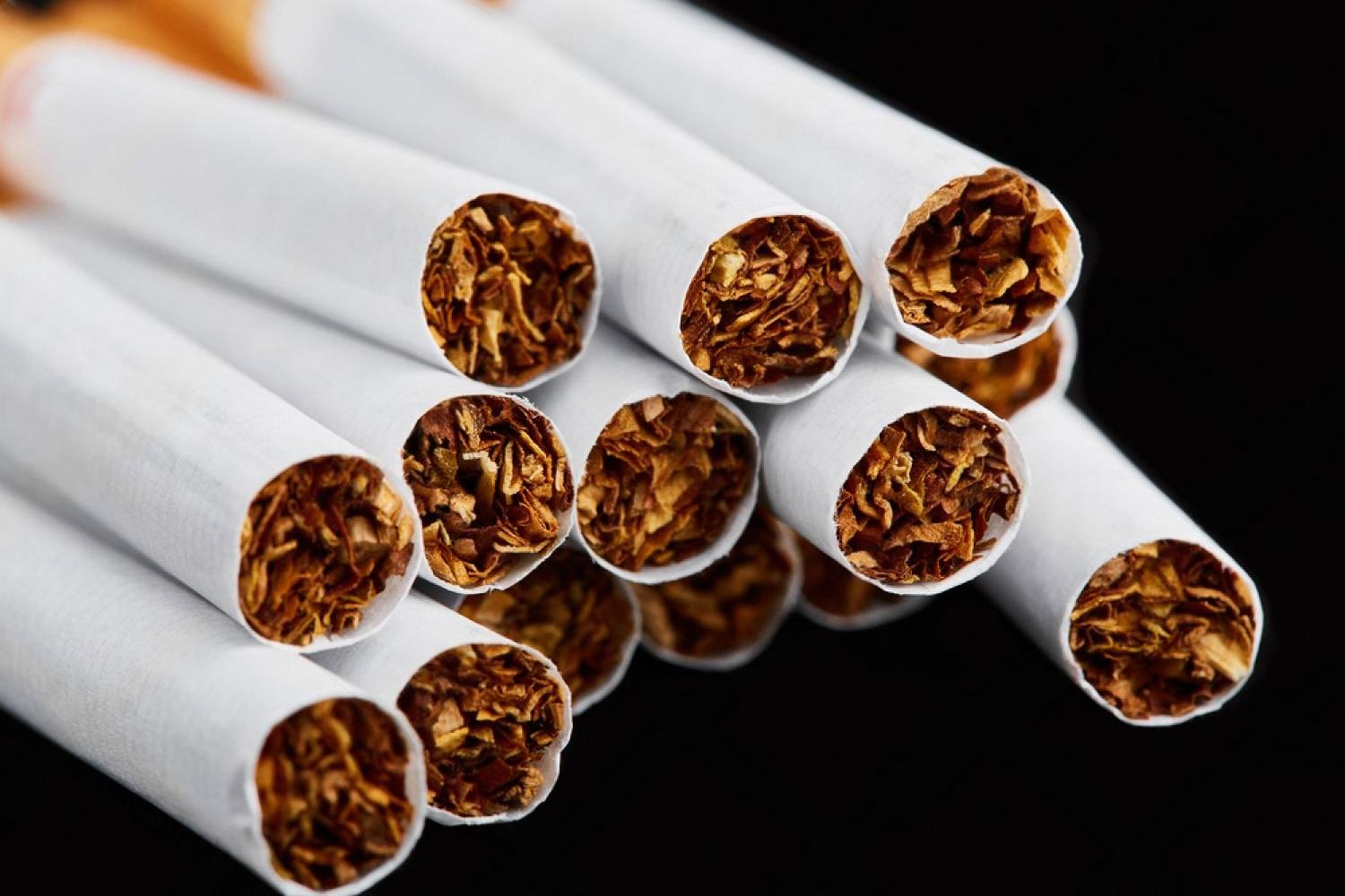 Stack of filter cigarettes viewed from the end, representing brand recognition in Dubai retail